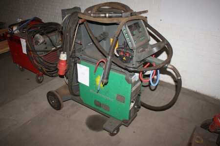 Welding rectifier, Migatronic Sigma 500 + wire feed unit (panels missing) +  welding cable + torch. Mounted in a frame on wheels