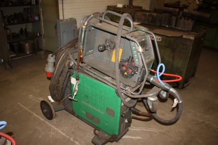 Welding rectifier, Migatronic Sigma 500 + wire feed unit (without cover) on wheels + welding cables + torch. Mounted in a frame on wheels