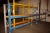 2 span pallet rack, 8 load beams, approx. 2.8 meters. 3 uprights, approx. height of 2 meters, width approx. 60 cm.