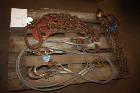 Pallet with lifting chains and steel cables with hooks, approved