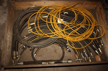 Pallet with various hydraulic hoses, etc.