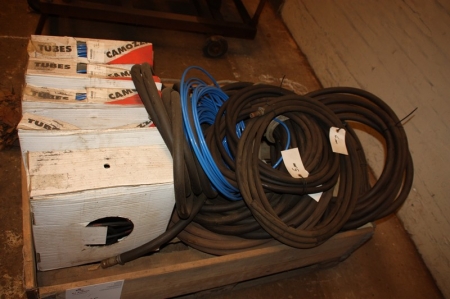 Pallet with rubber hoses + air hoses, unused