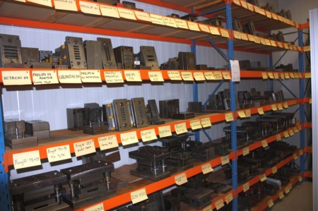 Various tools plus holders in 4 rack sections 
