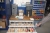 Drawer cabinet with reamers, drills, cutting tools etc. + steel rack with content
