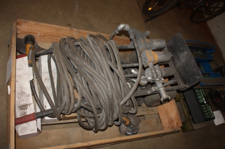 Pallet with various air tools and feeding tubes and manifolds on a Cart