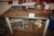 Work Bench with vise, approx. 1600 x 800 mm + panel for assortment boxes + assortment boxes with content + shelf with content + stand for cable reels containing power cable reels + shelf with various electric parts + panel with content + parts in the corn