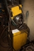CO2 welder ESAB LAG 400 + wire feeding box + swing arm + welding cable + welding handle + welding helmet. Mounted in a frame on wheels