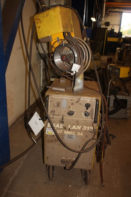 CO2 welding machine, ESAB LAN 315 + wire feed box, ESAB A10 MEH 30 + welding hose + welding handle. Mounted in a frame on wheels