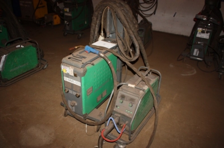 CO 2 welding rectifier, Migatronic Sigma 500, S/N 07030562, + wire feeder on wheels + welding cables welding + handle + welding mask. Mounted in a frame on wheels