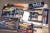 Pallet with various tools: sockets, pliers, spirit level, file, water pump pliers, etc.