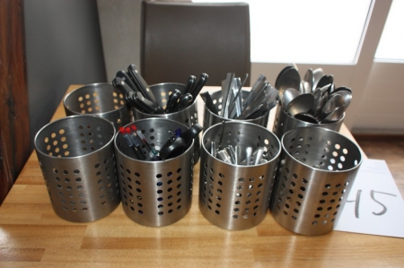 8 stainless steel containers with cutlery, etc.