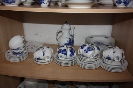 Parts of dinnerware on one shelf in the closet, Royal Copenhagen, braided edge