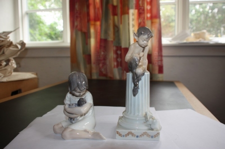 2 x porcelain figurines girl with doll and pan on column