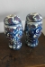 2 pcs porcelain jars, labeled L. Denmark. 1 jar riveted to the lid