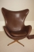 Armchair, "Egg", anniversary model. Arne Jacobsen. Leather and suede. Only produced in 999 copies. Produced by Fritz Hansen A / S. Chocolate brown leather and same color suede backing. Produced in 2008.