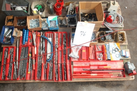 Pallet with various drills, screws, bolts, etc.