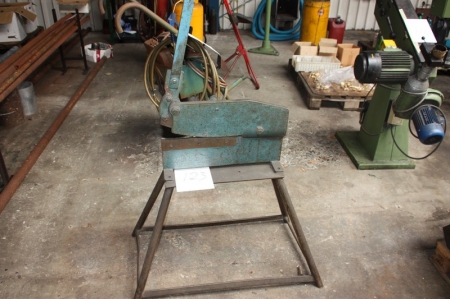 Flat steel cutter on stand