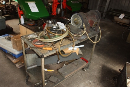 Trolley with content including bench sander