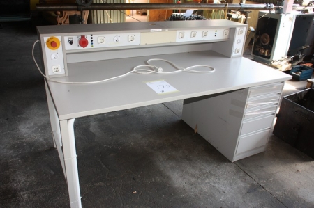 Assembly bench, approx. 1800 x 880 mm, with base cabinet and power outlets, 220/380 volts. Emergency stop