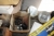 Pallet with various automobile headlights, oil filters, brake, ignition cables, etc.
