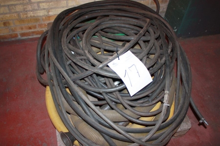 Pallet with various suction hoses and air hoses