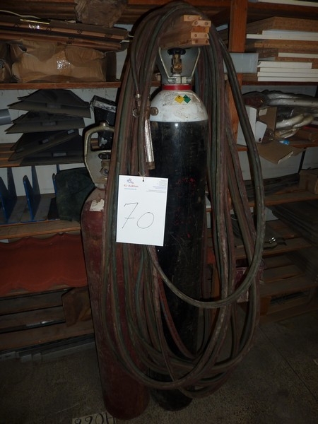 Oxygen and acetylene cylinders with hose