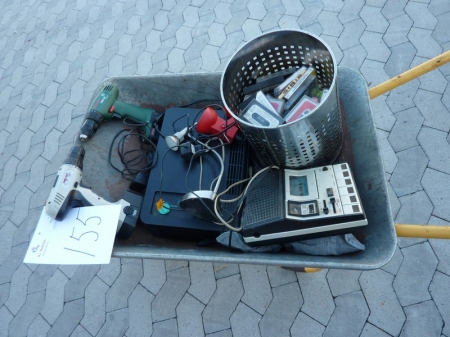 Wheelbarrow with content including  cassette tape recorder + cassettes. Sold by private individual. Only VAT on fees.