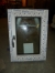 Window, white plastic, with gray aluminum exterior. 52.5 x 72 side mounted