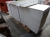 Approximately 50 x white chipboard pallet, approximately 195x58x16 mm. Damaged corners