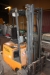 Electric forklift truck with a defective battery. Still R 50-10. Charger. Hours: 10433. capacity: 1000 kg. Lift height approx 3 meters. Clear view mast. Hydraulic side shift