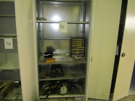 Steel cabinet with 2 doors, no key, containing electrical equipment, range rack etc.