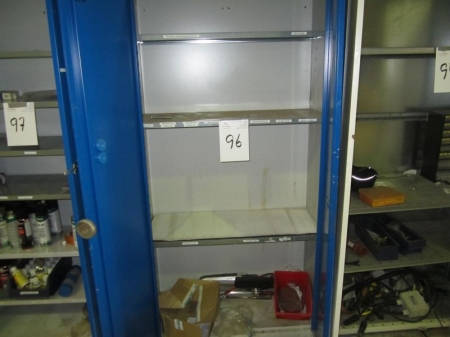 Steel cabinet with 2 doors, no key, containing hacksaws, etc.