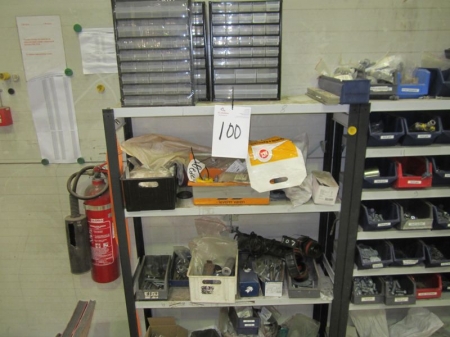 Shelf containing new range racks, bolts, etc.