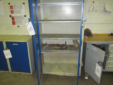 Steel cabinet with 2 doors, no key, containing welding accessories