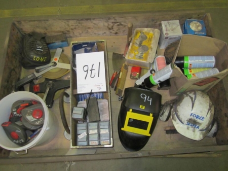Pallet with spray, hand tools, welding helmets, tape measure, etc.