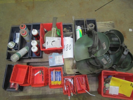 Pallet with welding helmets, welding accessories and other tools