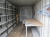 20' shipping container No. APT065124, fair condition with boom lock without the lock itself, with power installations and lighting, work bench with vise and drawer and 5 compartments storage shelves in metal
