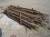 Pallet with heavy lifting strap, width 60 cm, length estimated 15 feet, and stand with wood