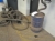Extract bin and various extraction hose on the floor