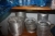 Various aluminum containers etc. on 3 shelves as marked