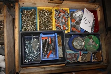 Pallet with various screws, drills, etc.