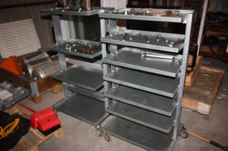2 shelf carts containing various hand tools