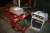 Trolley with content including pump with counter + trolley with content including power angle grinder and auto charger, Einhell BT-BC15, 15 Amp