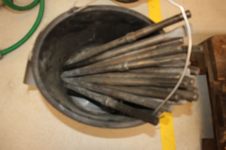 Bucket with chisels