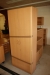 Various office furniture: desk with two drawer sections + base cabinet with door + high bookcase with doors + 2 shelves with doors + 4 shelving