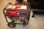 Petrol-powered generator on wheels. Engine: Honda EM4500. Outlet: 2 x 220 V + 12 volts. Tested OK
