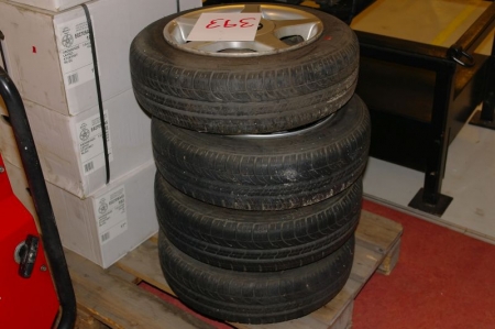 4 tires on alloy wheels, fits on Suzuki. Marked. MiM (145/7 or 13)