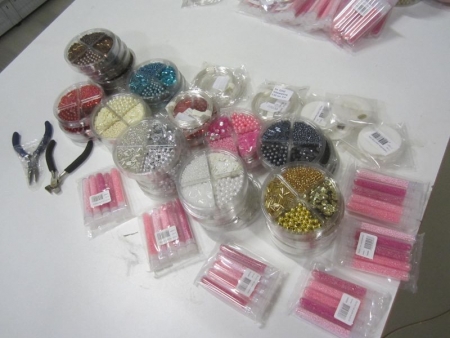 Beads, cords, wires, pliers, approximately 60 units (file photo)