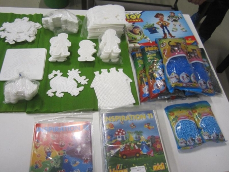 Approximately 64 paragraph pearl templates in Hama, six bags beads a 6,000, two small bags in assorted colors, 1 set of Toy Story, and 11 catalogs (file photo)
