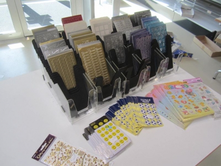 Estimated 280 paragraph stickers in various designs and finishes, which included 5 pcs display